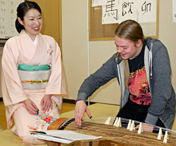 Student playing koto