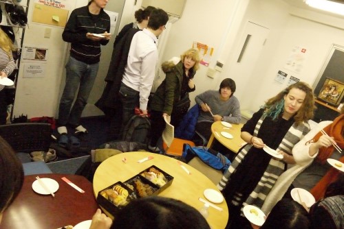 Japanese school students eating new year food