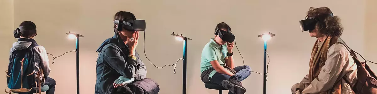 Group of people using VR sets